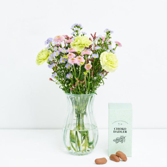 Den lille hilsen med dadler med chokoladeovertræk